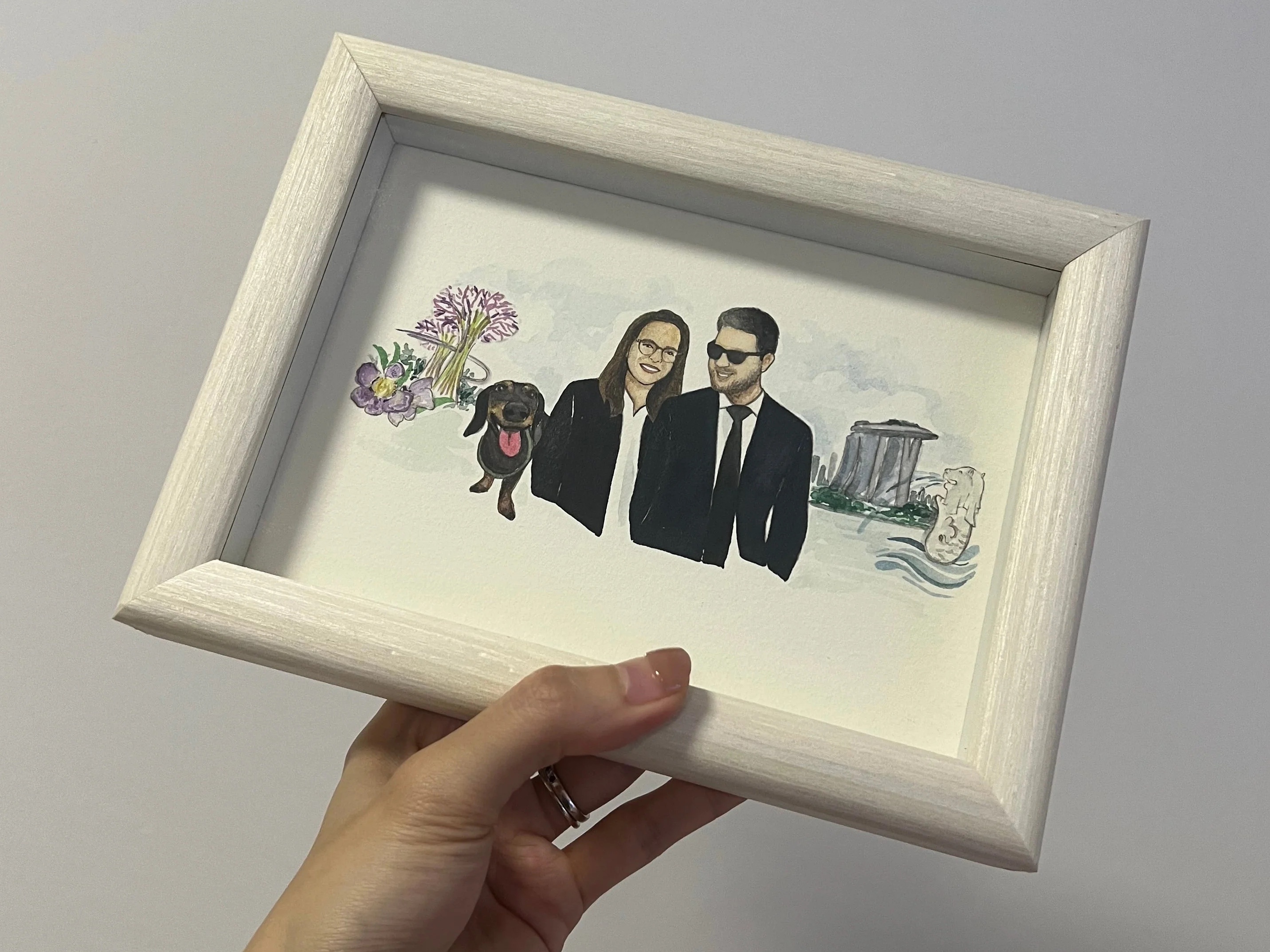 Couple watercolor portrait featuring a their pet with iconic SG icons including the MBS