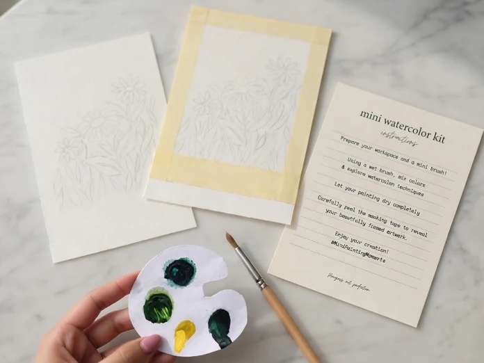 Compact and travel friendly mini watercolor painting kit with instructions
