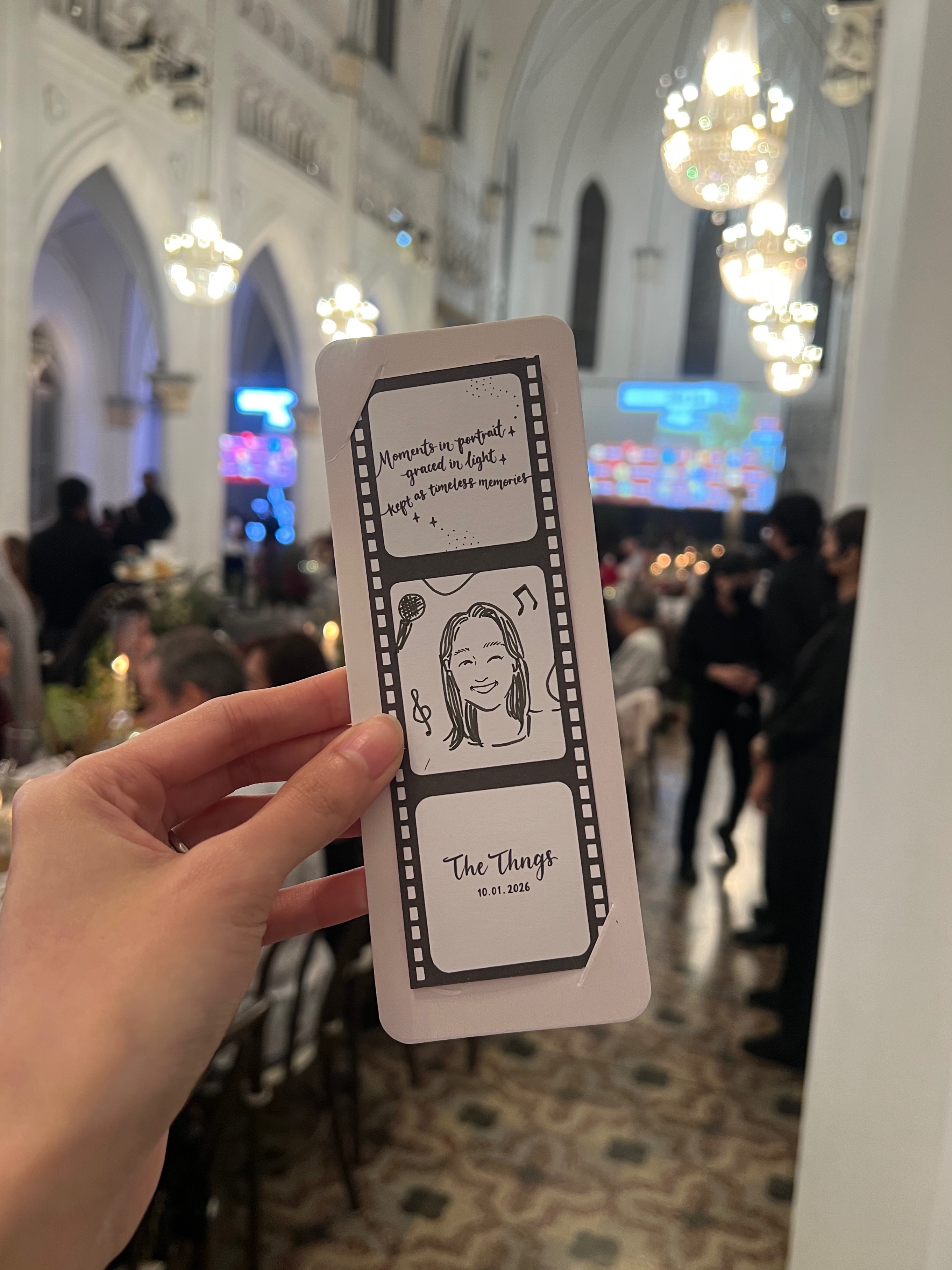 Portrait doodle film strip at Chjimes Hall Singapore